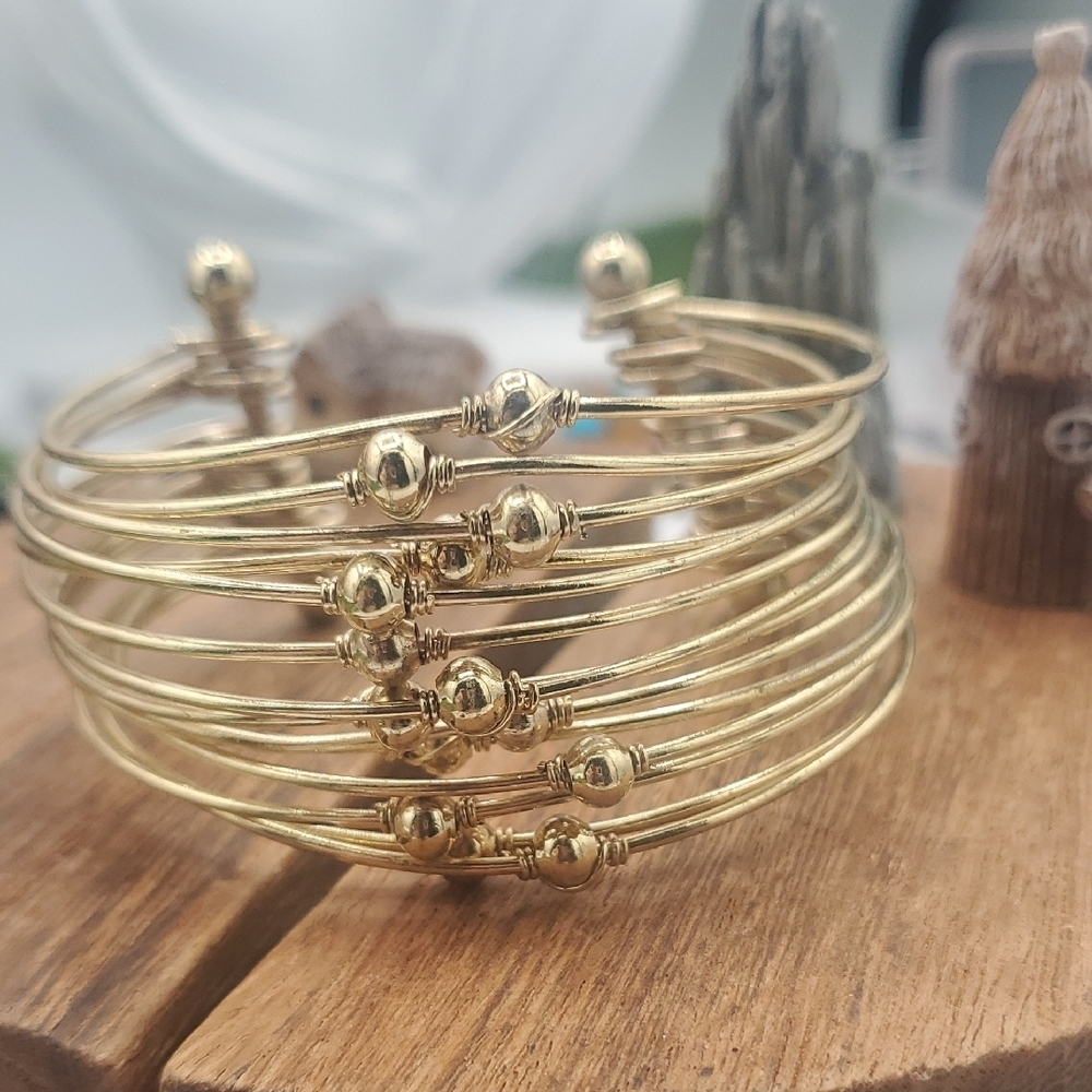 Gold Tone Cuff Lace Melt Bracelet  Overflow